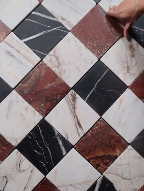 Burgundy black and white marble checkerboard inlay   material craft interior design Dubai